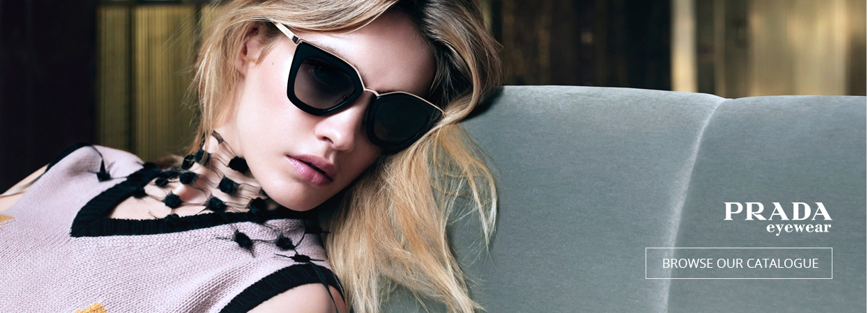 Woman wearing black sunglasses, from the original Eyestore eyewear collection