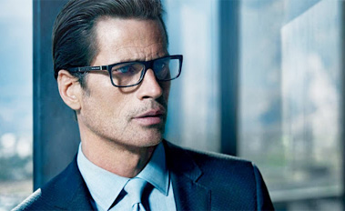 Man wearing blue prescription glasses